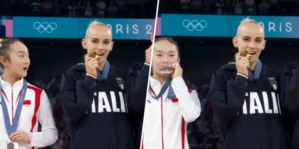 Chinese Gymnast Bites Medal