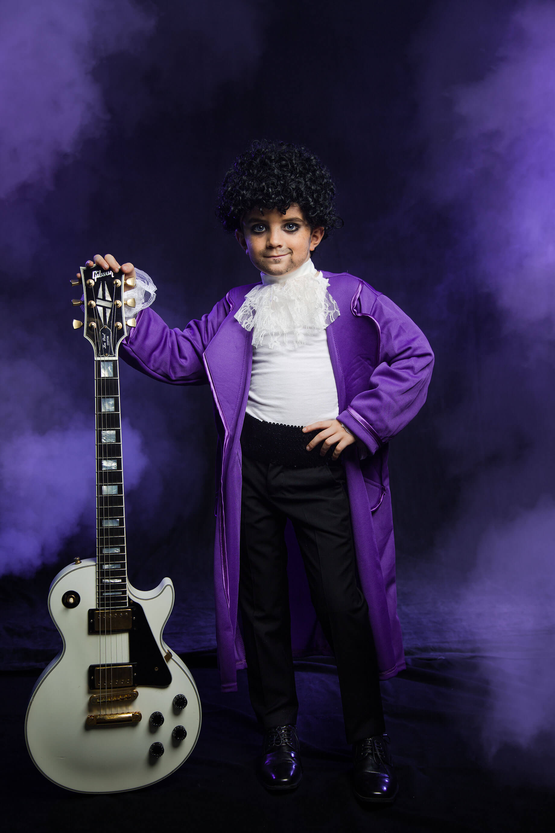 Prince in purple outfit online