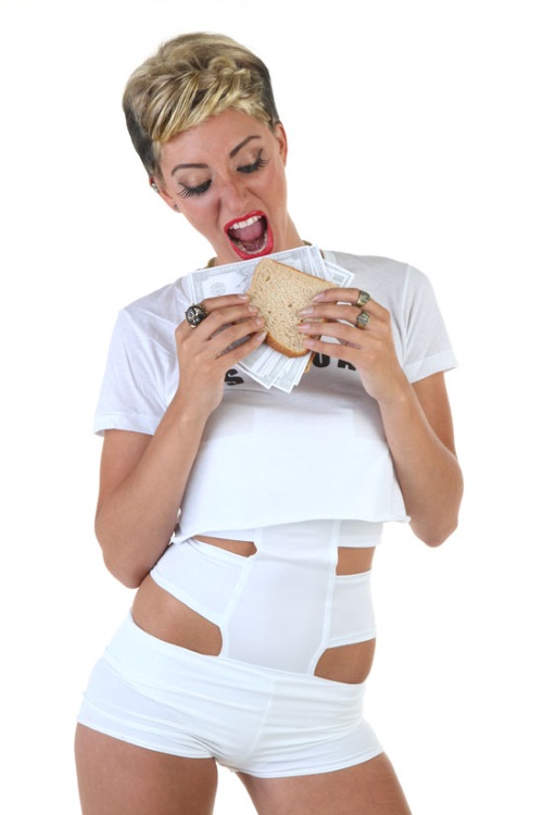 Miley Cyrus Eating a Money Sandwich