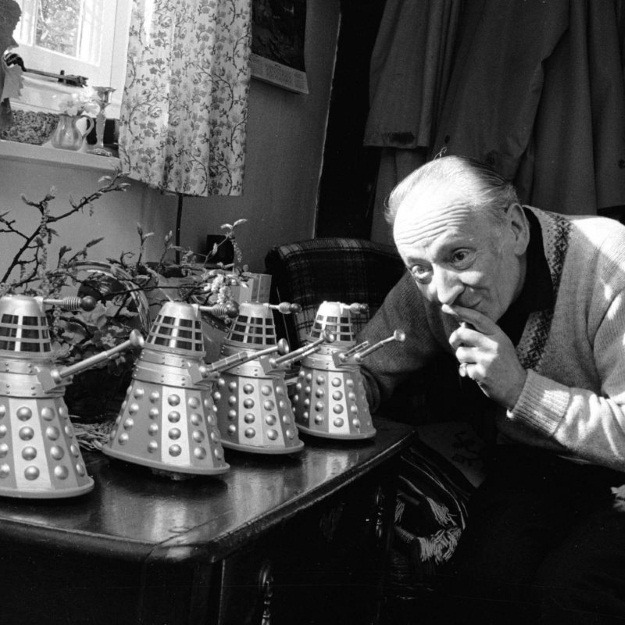 First Doctor William Hartnell with Dalek toys made by Louis Marx and Company.