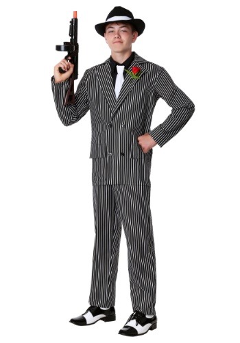 a Teen wearing a 1920s Gangster Costume of pinstripe pants and jacket, white tie, a fedora hat, and wingtips, with a red rose on his lapel, while holding a fake gun as props