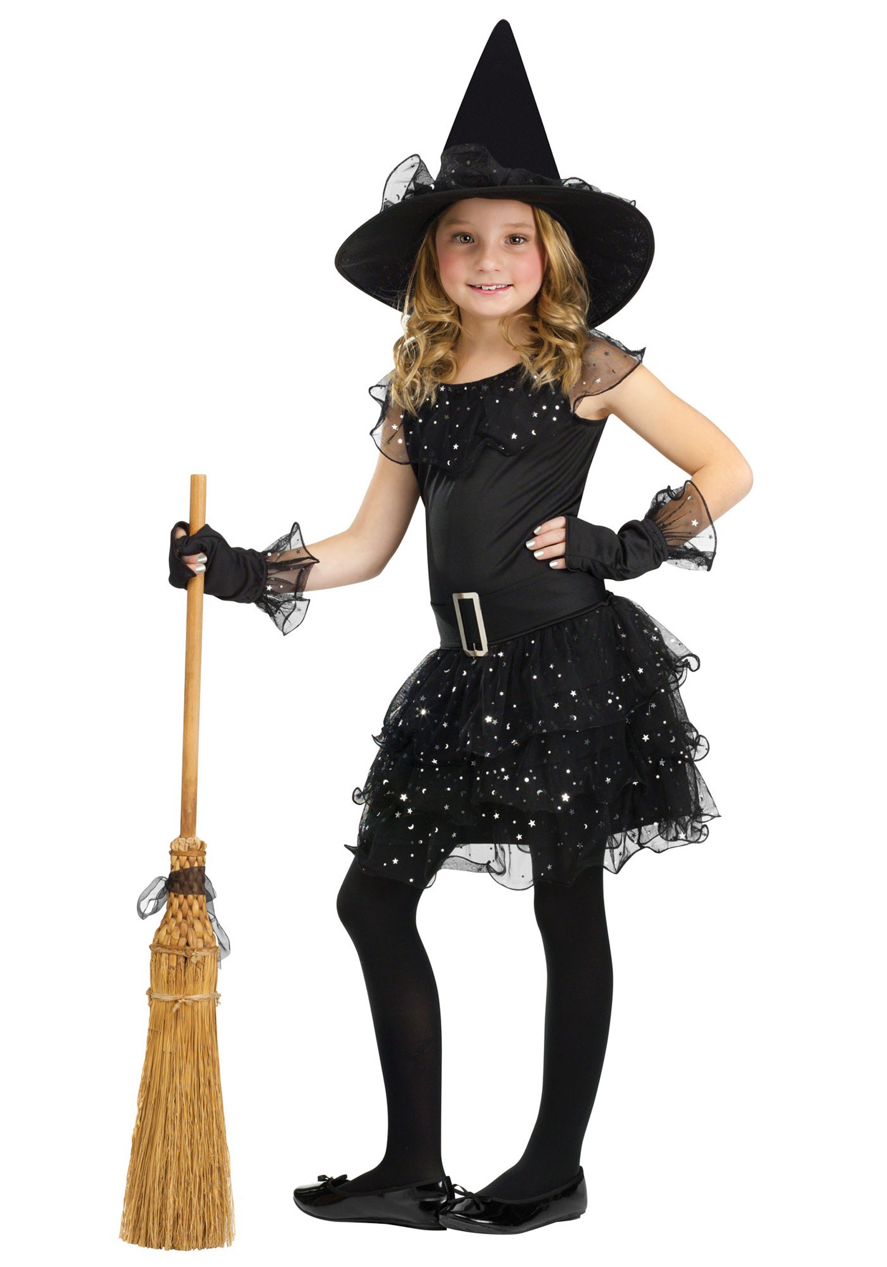 Halloween. a Girl in a Robe and Hat. a Little Sorceress in the