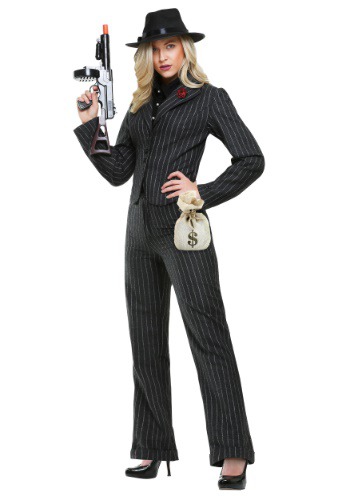 a woman wearing a pinstripe gangster costume, complete with a fedora hat, toy gun, and a money bag