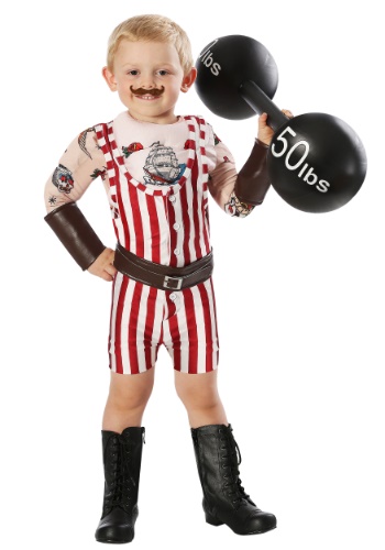 a boy dressed in Vintage red-striped Strongman Toddler Costume while holding an inflatable 50-pound dumbbell