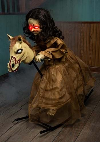 animated demon doll on rocking horse