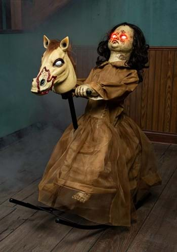 animated demon doll on rocking horse