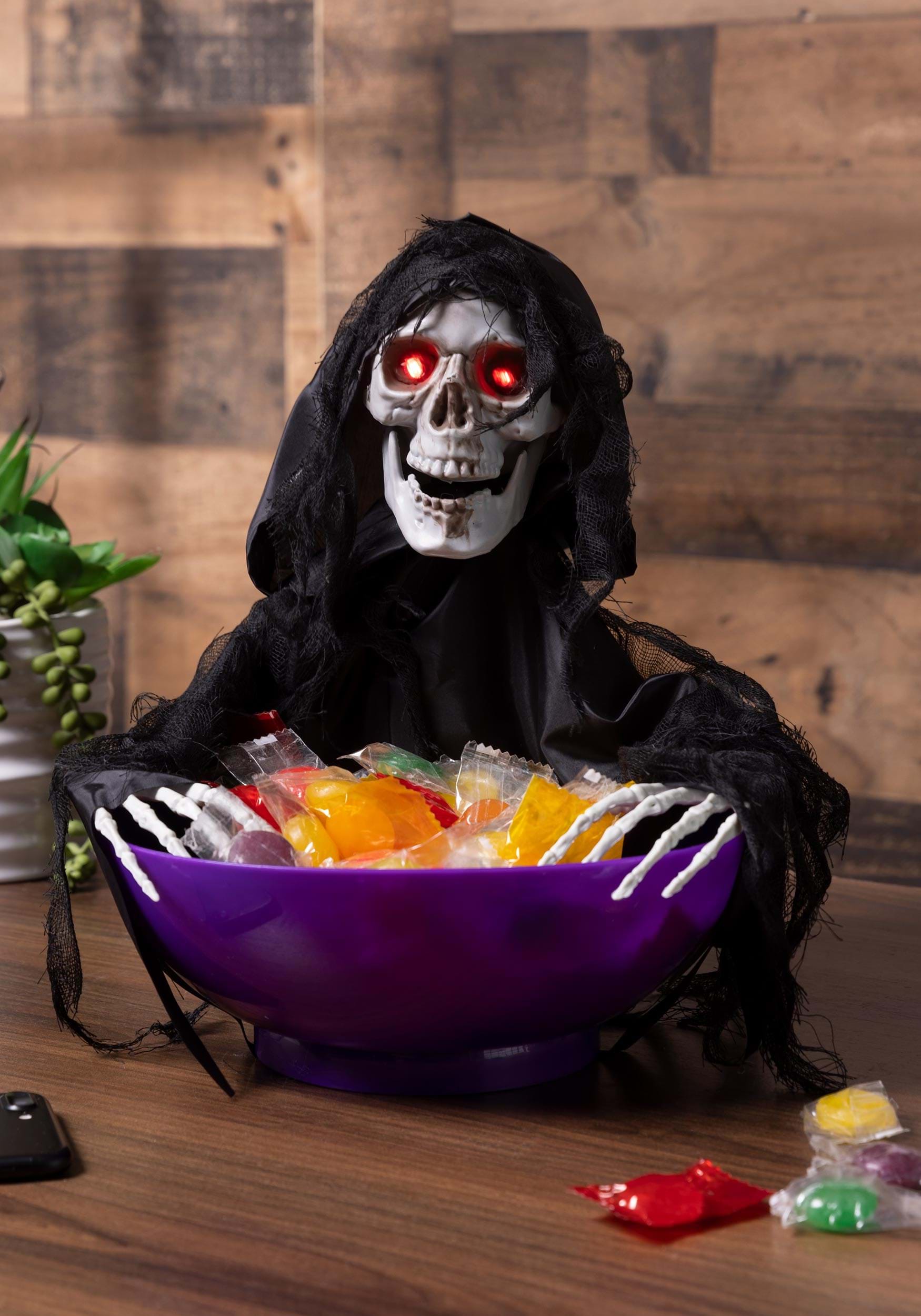 https://images.halloweencostumes.com/products/81336/2-1-279827/shaking-reaper-candy-bowl-alt-5.jpg