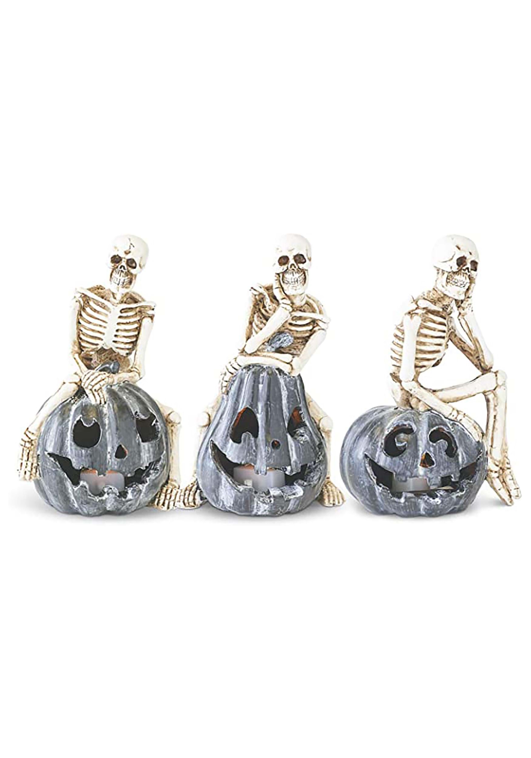 Set of 3 Resin Skeletons Sitting on LED Jack 'O Lanterns Halloween Decoration